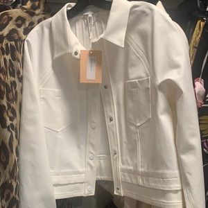 White stretch denim cropped jacket.